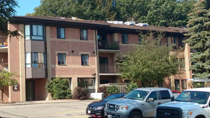 Apartment complex with a newly completed roof