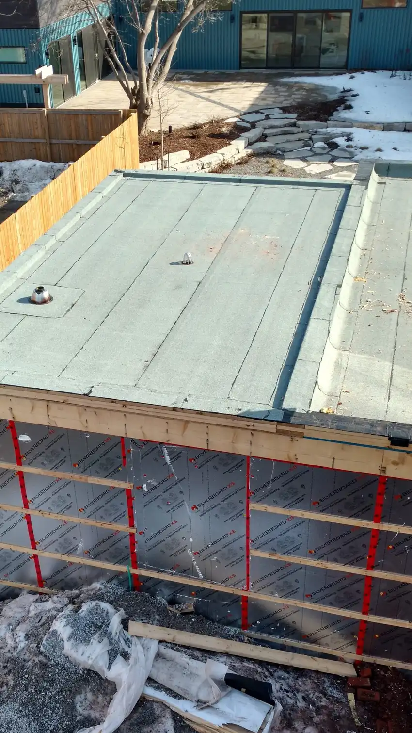 Flat roofing work in progress on a building on Elgin Street
