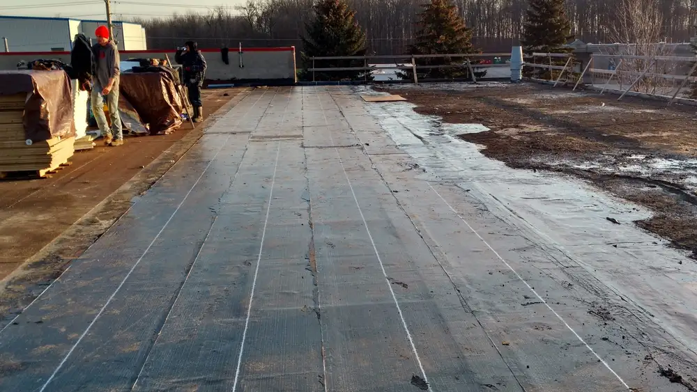 Flat roof part way through an SBS modified membrane installation