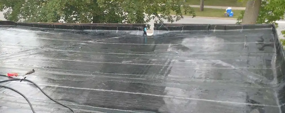 Flat roof tapered with insulation to slope toward the drains